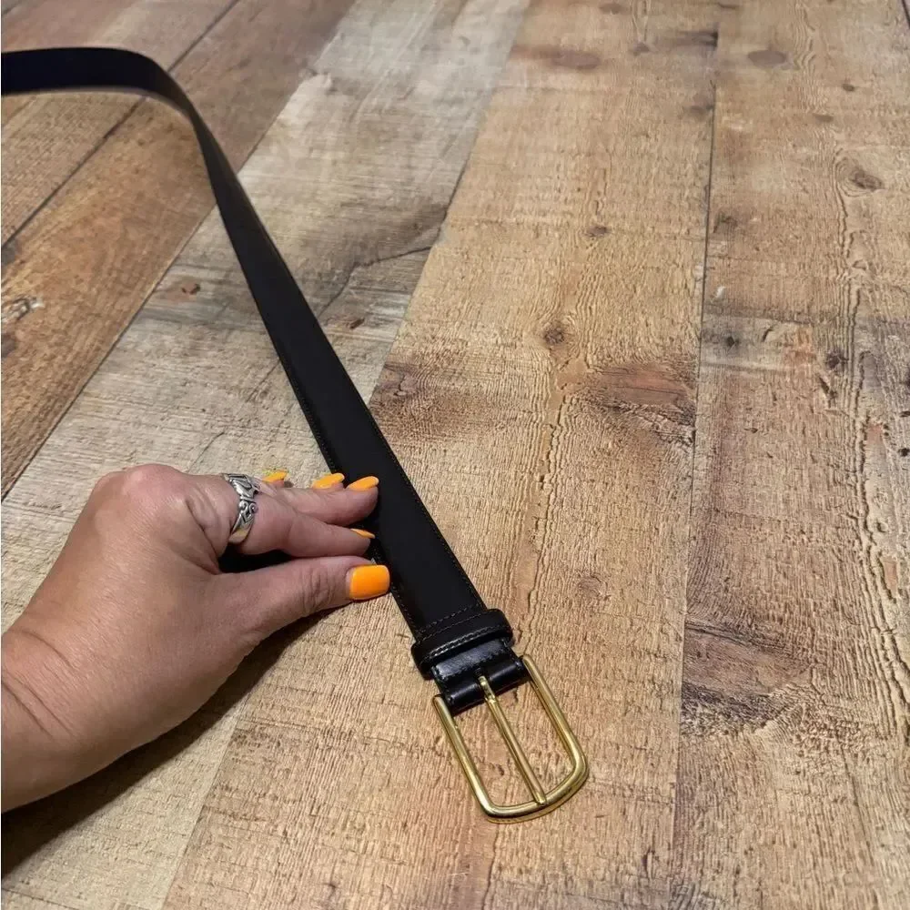 Black leather coach belt *has flaw